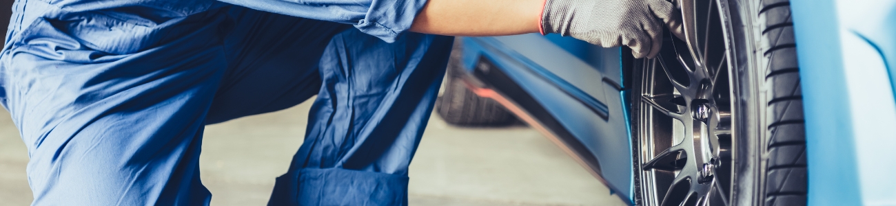Professional mechanic performing vehicle assessment in Adelaide